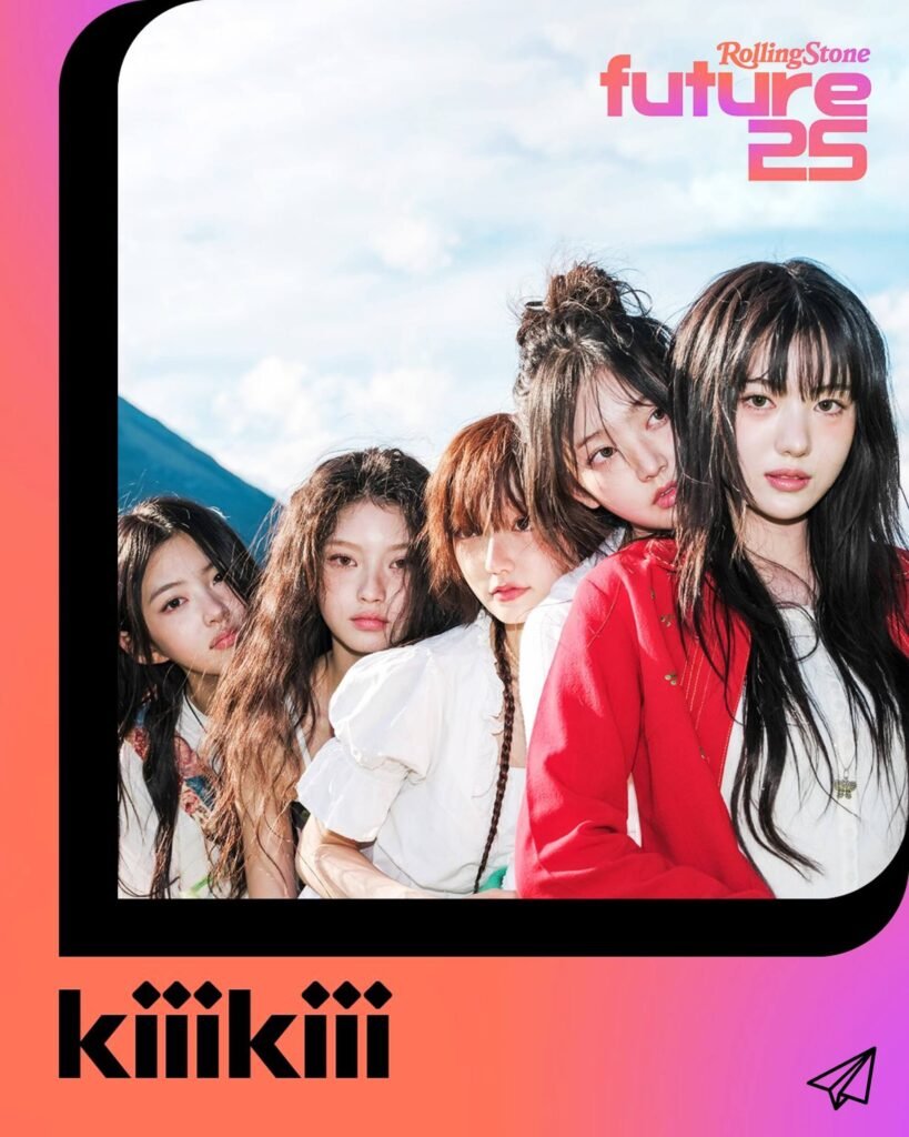 The members of kiikii are standing in a row and looking at the camera.
