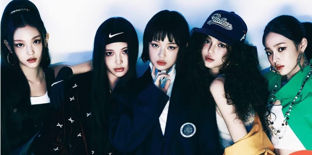 Photos taken by New Jeans members wearing school uniforms and sportswear
