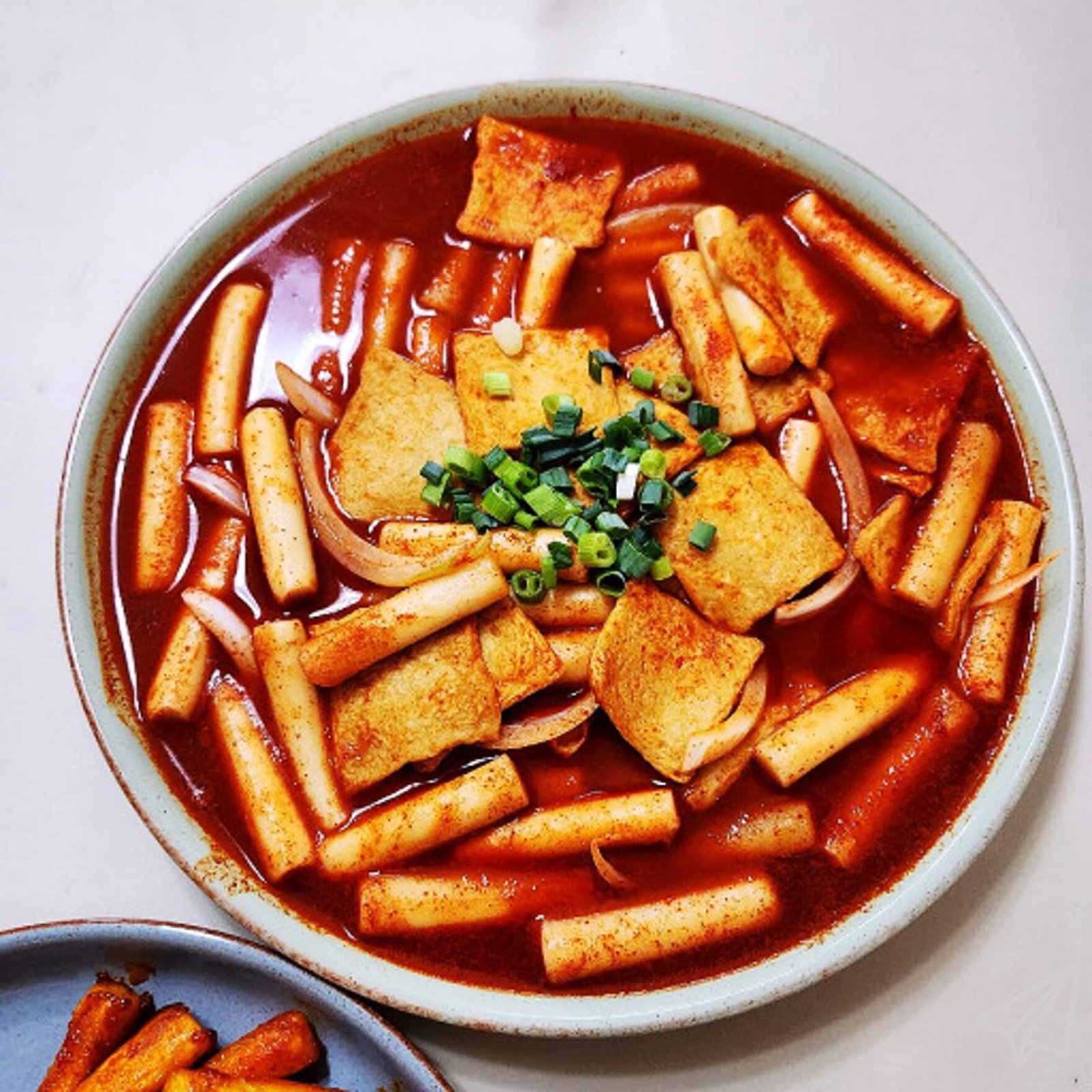 A plate of delicious tteokbokki, well-cooked and served