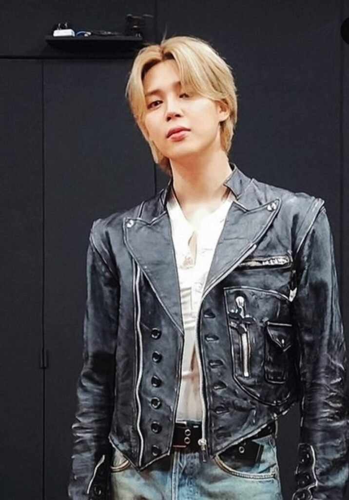 Jimin wearing a leather jacket